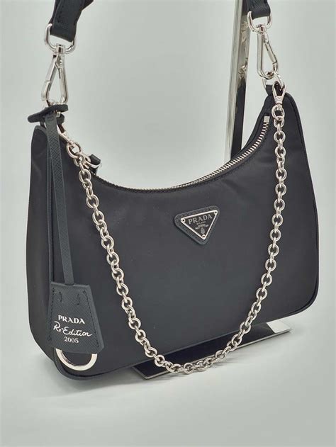 prada pochette price|prada bag with small pouch.